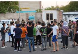 Residents of al-Basra using generators during a blackout