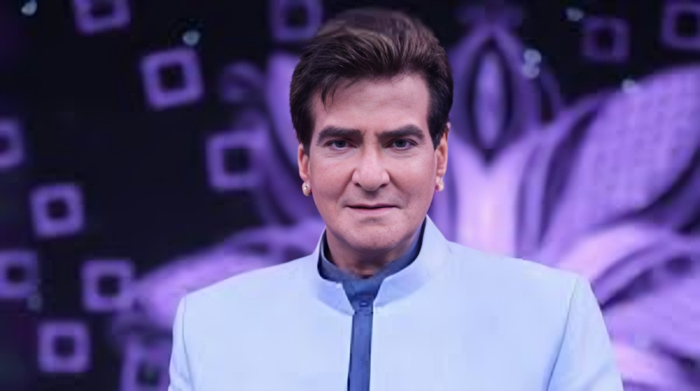 Jeetendra inspecting a modern construction site, symbolizing his transition into real estate