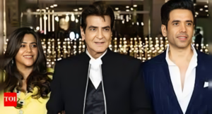 A celebratory moment as Jeetendra and his team toast to the ₹855 crore land sale