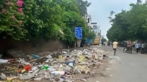 “Gurugram street cleaning crew starting work at dawn”