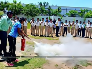 Volunteers guiding school students during an emergency evacuation drill on school grounds