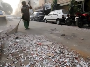 Residents cleaning a Delhi street during the Freedom from Garbage campaign