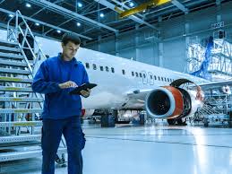 FAA technician inspecting aircraft metal alloy during safety check”
