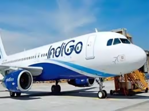 IndiGo premium lounge with comfortable seating and passengers relaxing